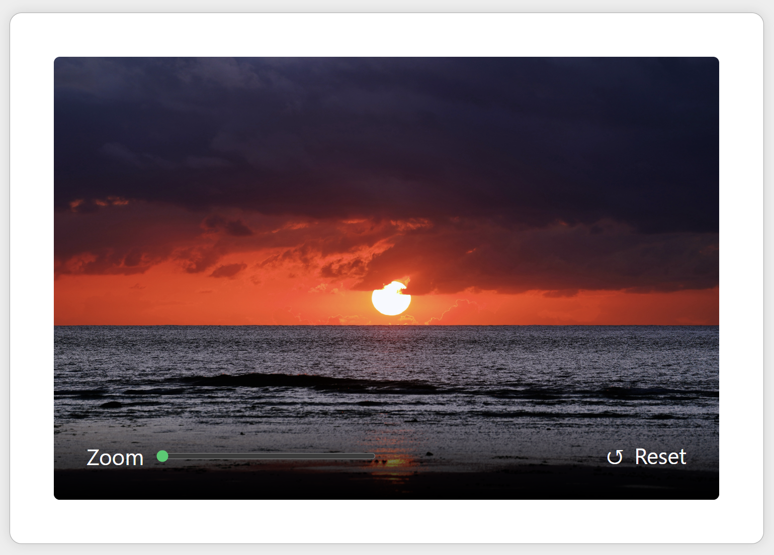 The image editor, showing a picture, and a zoom control slider below it.