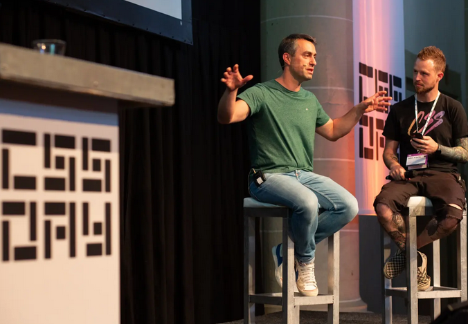 A photo of me on stage at CSS Day