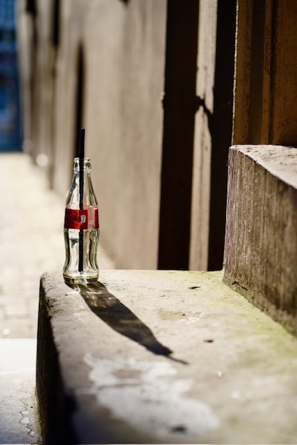 The lonely Coke bottle.
