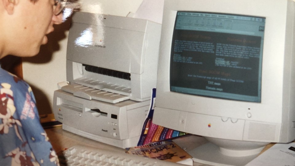Me, in front of the computer, browsing the web, in 1996